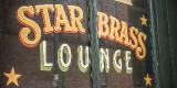 Star Brass Lounge painted window